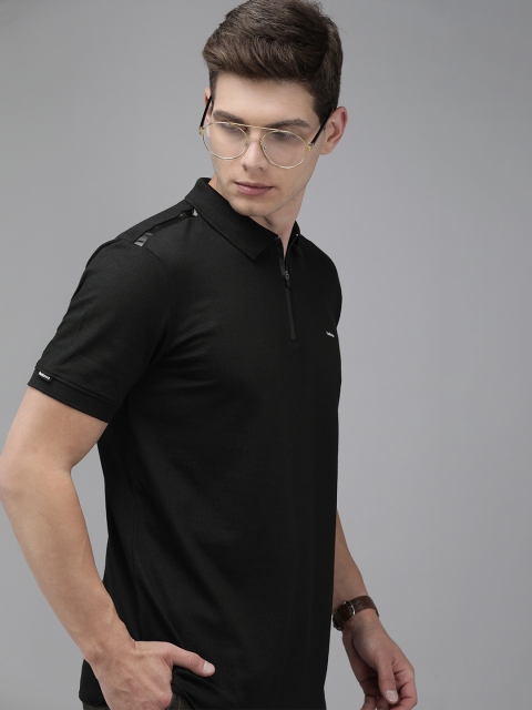

Van Heusen Men Black Solid Polo Collar T-shirt