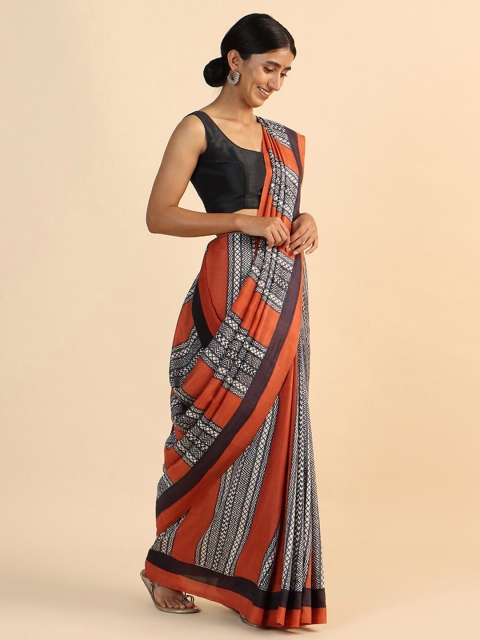 

Taneira Black & Orange Pure Silk Saree