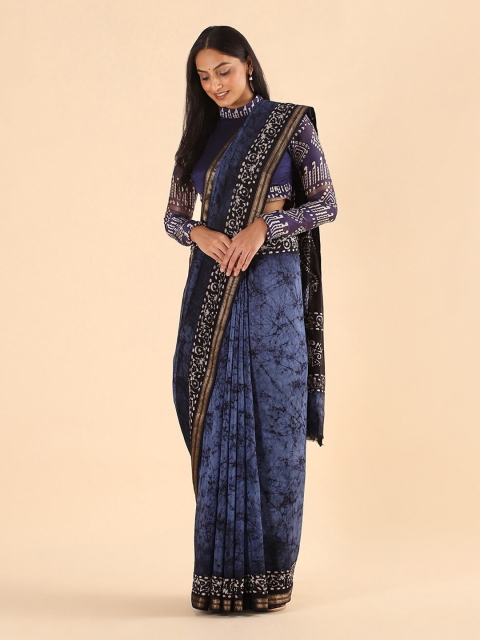 

Taneira Blue & Black Batik Ethnic Motifs Silk Cotton Saree