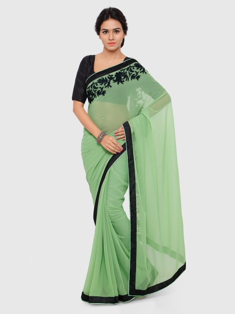 

Nanda Silk Mills Green Embroidered Georgette Saree