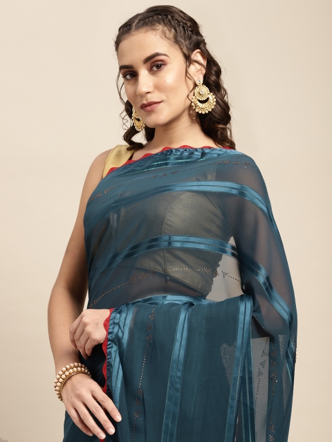 

Mitera Teal & Red Embellished Beads and Stones Saree