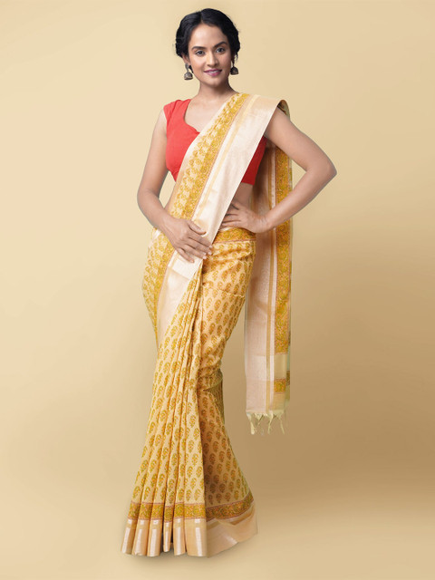 

Unnati Silks Brown & Yellow Ethnic Motifs Zari Silk Cotton Chanderi Saree