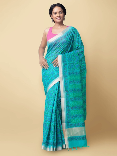 

Unnati Silks Turquoise Blue & Silver-Toned Ethnic Motifs Silk Cotton Chanderi Saree