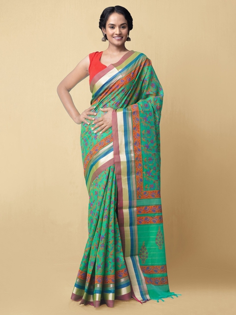 

Unnati Silks Green & Orange Ethnic Motifs Printed Silk Cotton Chanderi Saree