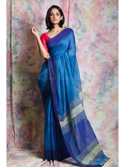 

Charukriti Blue & Navy Blue Woven Saree