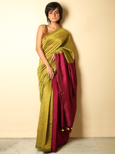 

Charukriti Yellow & Magenta Solid Cotton Blend Handloom Saree
