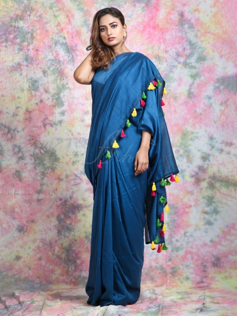 

Charukriti Blue Solid Pom Pom Detailed Cotton Saree