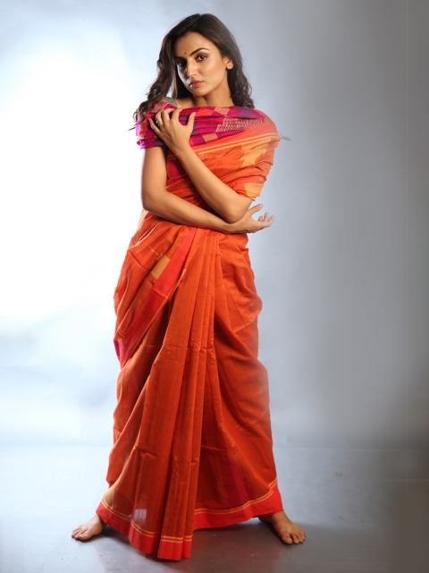 

Charukriti Orange & Pink Woven Design Saree