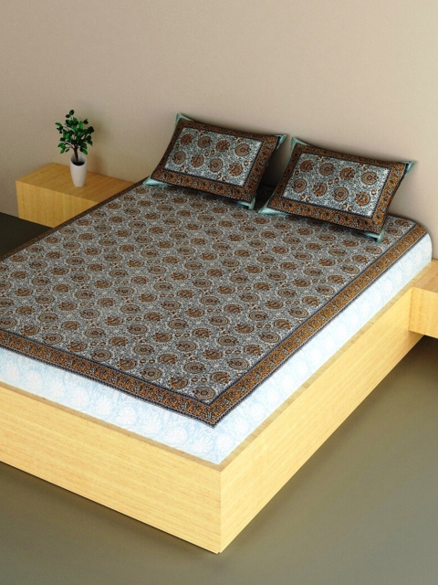 

Aura Off White & Brown Ethnic Motifs 200 TC 1 King Bedsheet with 2 Pillow Covers