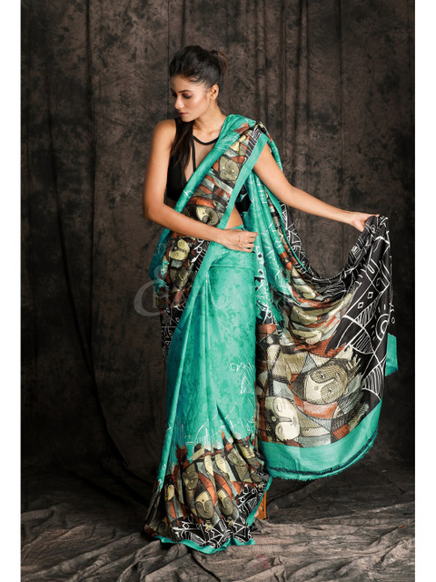 

Charukriti Blue & Black Ethnic Motifs Pure Silk Handloom Saree