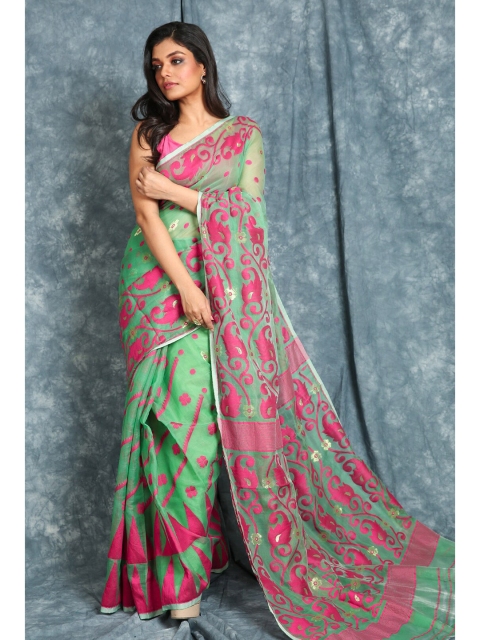 

Charukriti Green & Magenta Floral Zari Saree