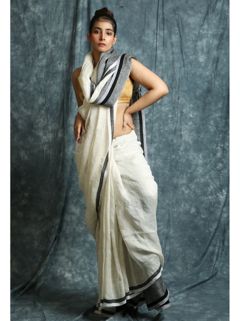 

Charukriti Off White & Grey Saree