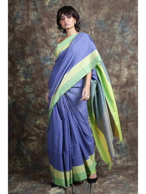 

Charukriti Blue & Green Solid Saree