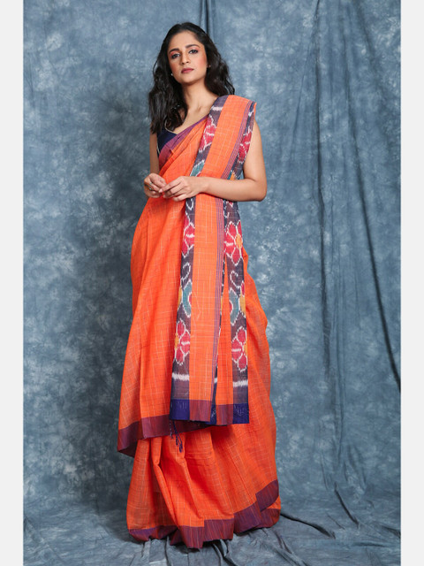 

Charukriti Orange & Maroon Checked Saree