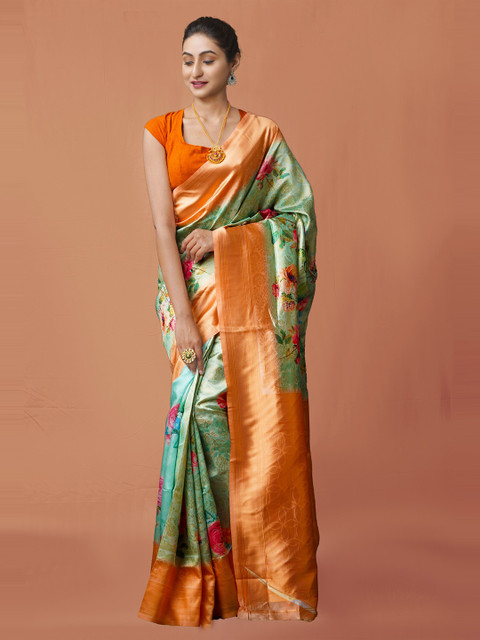 

Unnati Silks Green & Orange Floral Digital Printed Zari Silk Cotton Baluchari Saree