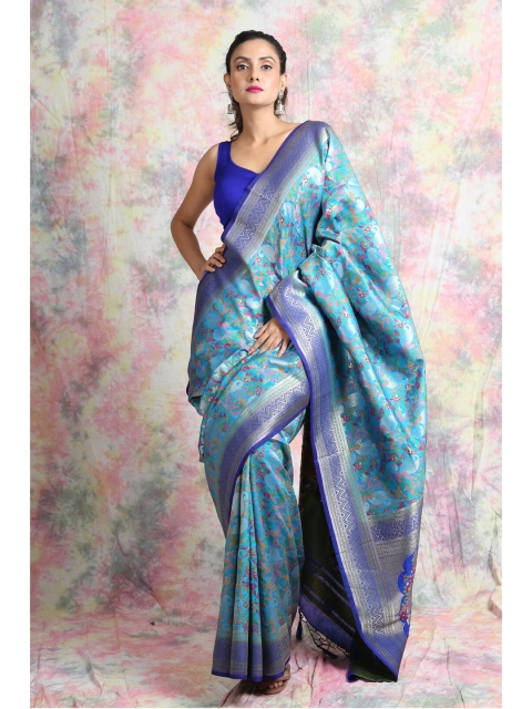 

Charukriti Blue & Silver-Toned Ethnic Motifs Zari Pure Silk Handloom Saree