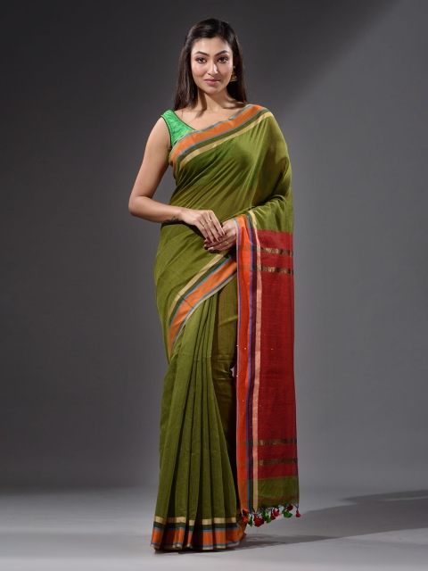 

Charukriti Green & Red Sequinned Saree