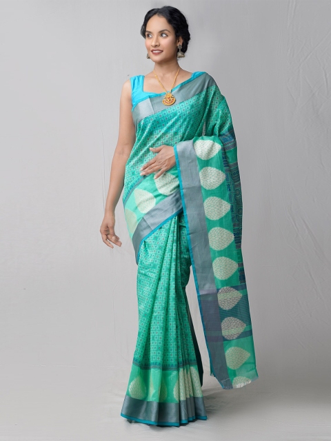 

Unnati Silks Green & Grey Ethnic Motifs Zari Silk Cotton Chanderi Saree