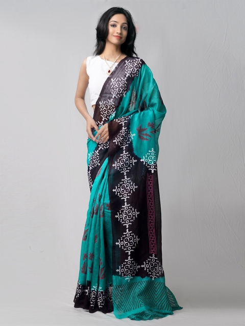 

Unnati Silks Teal & Black Ethnic Motifs Pure Cotton Kota Saree