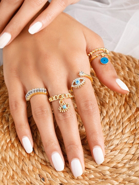 

TOKYO TALKIES X rubans FASHION ACCESSORIES Set Of 4 Gold-Plated & Blue Stone-Studded Enameled & Evil Eye Finger Rings