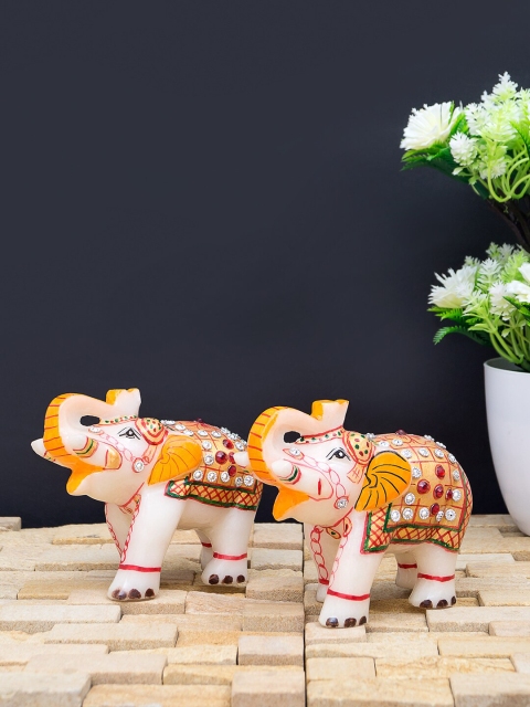 

Golden Peacock Set of 2 White & Orange Marble Elephant Figurine Showpieces