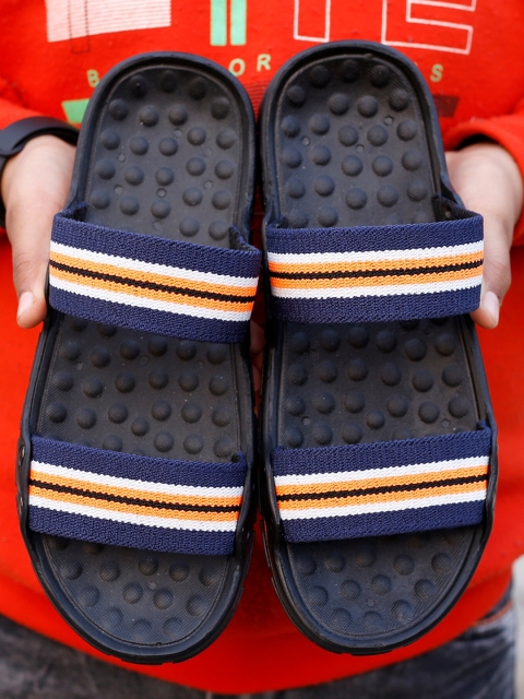 

Woakers Men Blue Striped Slip-On