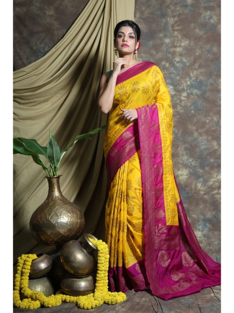 

Charukriti Yellow & Fuchsia Woven Design Pure Silk Saree