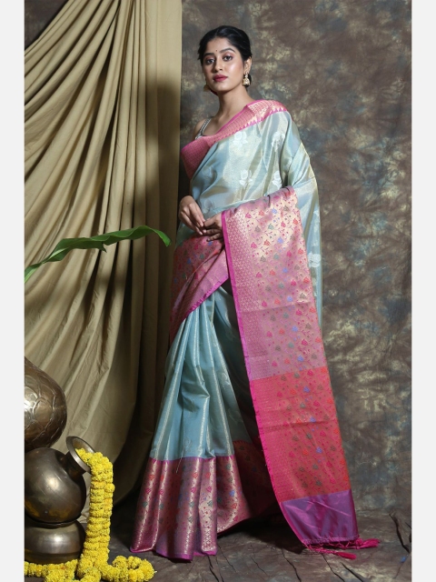 

Charukriti Blue & Pink Ethnic Motifs Zari Tissue Saree