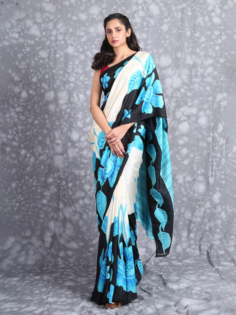 

Charukriti White & Blue Floral Pure Silk Saree
