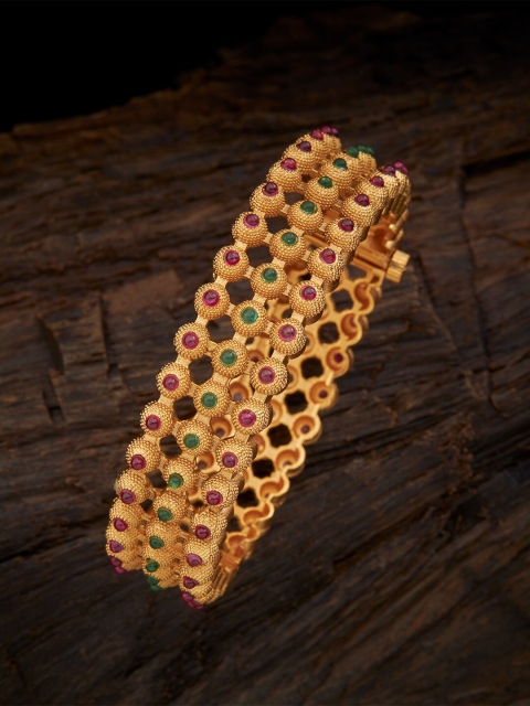 

Kushal's Fashion Jewellery Women Gold-Plated & Red Stone Studded Traditional Bangle