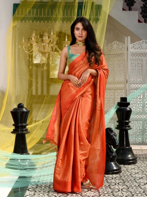 

Charukriti Orange & Gold-Toned Zari Silk Blend Saree