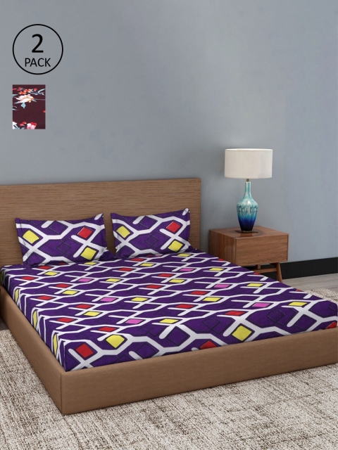 

Dhrohar Navy Blue & Maroon Floral 180 TC 2 King Bedsheet with 4 Pillow Covers