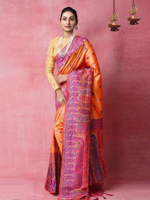 

Unnati Silks Orange & Pink Ethnic Motifs Zari Silk Blend Banarasi Saree