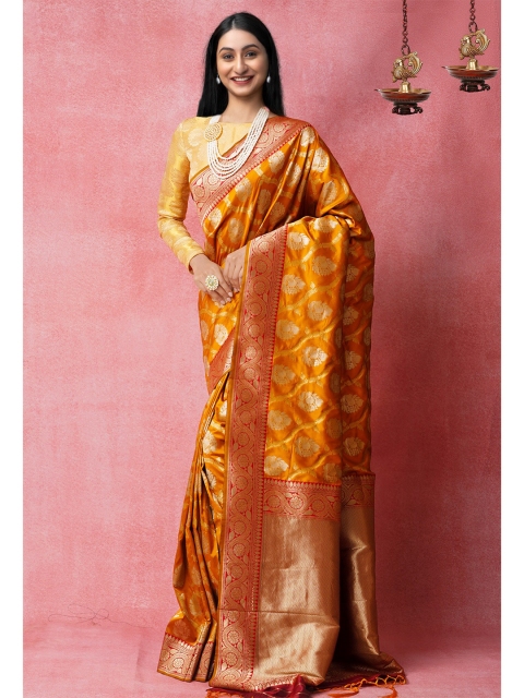

Unnati Silks Orange & Gold-Toned Ethnic Motifs Zari Silk Blend Banarasi Saree