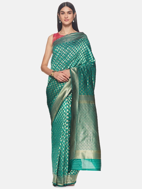 

IVOC Sea Green & Gold-Toned Ethnic Motifs Zari Art Silk Banarasi Saree