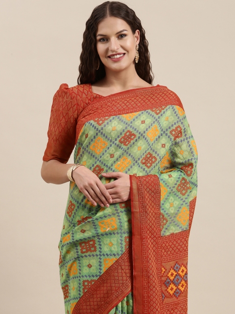 

Satrani Green & Red Ethnic Motifs Saree