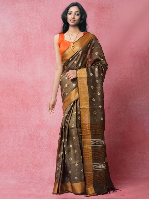 

Unnati Silks Green & White Ethnic Motifs Zari Pure Silk Tussar Saree