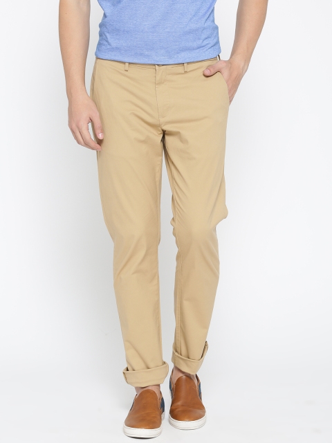 

Blackberrys Men Beige Sharp Fit Solid Trousers