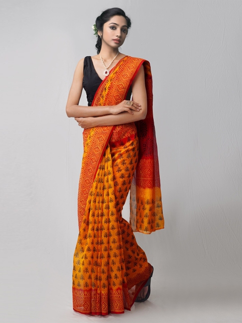 

Unnati Silks Orange & Black Floral Net Patola Saree