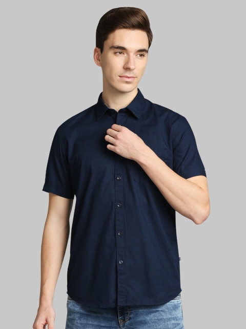 

Parx Men Blue Solid Slim Fit Casual Shirt