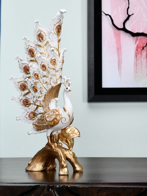 

Athome by Nilkamal Gold-Toned & White Textured Peacock On Stand Showpiece