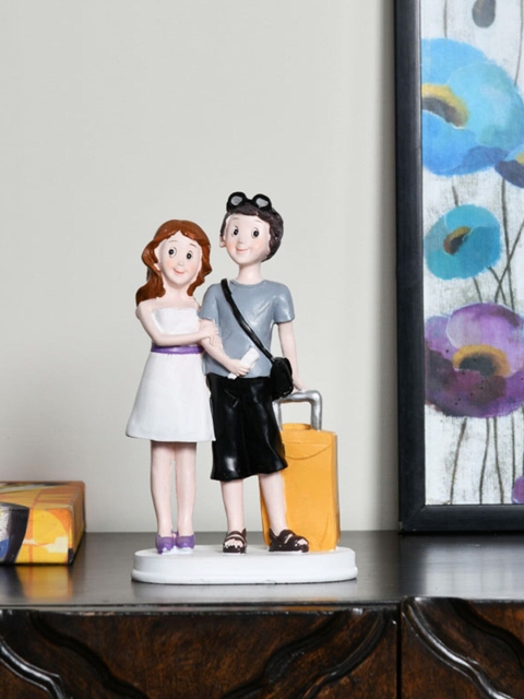 

Athome by Nilkamal Black & White Polyresin Couple Travellers Showpiece
