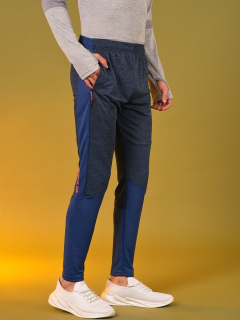 

Campus Sutra Men Blue Textured Track Pants