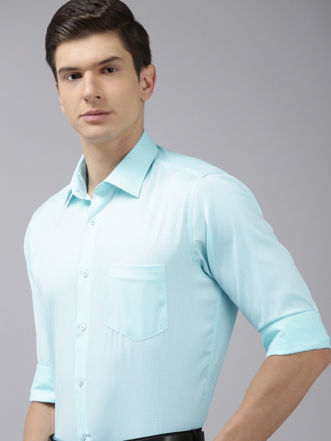 

Van Heusen Men Blue Standard Custom Fit Geometric Self Design Pure Cotton Formal Shirt