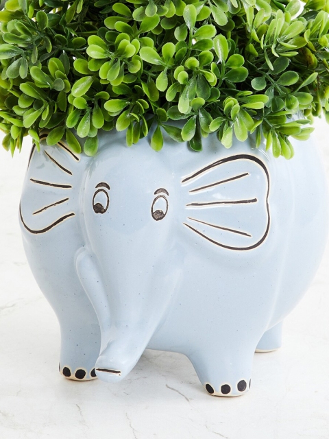 

Home Centre Blue Printed Elephant Ceramic Planters