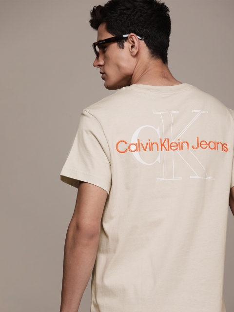 

Calvin Klein Jeans Men Beige Brand Logo Printed Slim Fit T-shirt