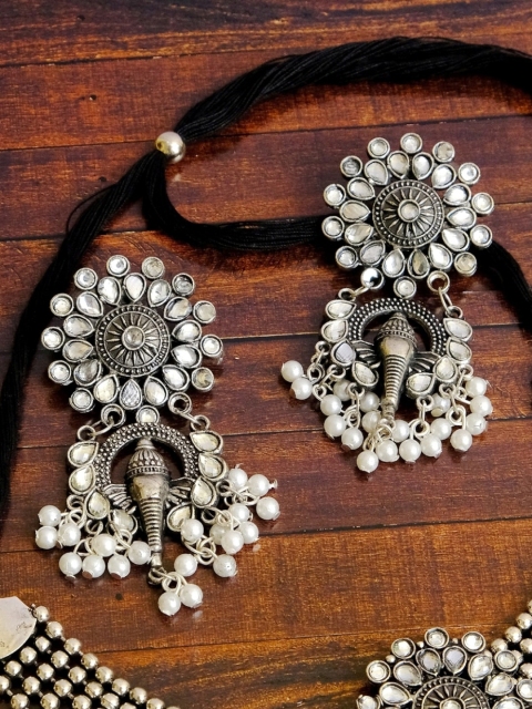 

Crunchy Fashion Women Silver-Toned & White Contemporary Jhumkas Earrings