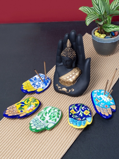 

Golden Peacock Black & Gold-Toned Palm Buddha with 5 Ceramic Incense Stick Holder