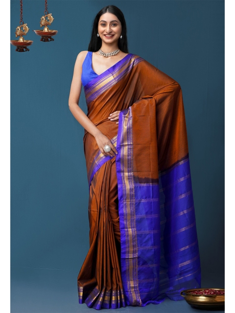 

Unnati Silks Rust & Blue Zari Narayan Peth Saree