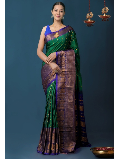 

Unnati Silks Blue & Green Woven Design Zari Handloom Poly silk Saree